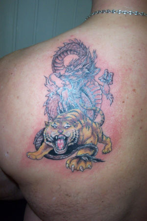 Tatouage tigre et dragon