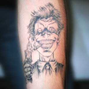 Tatouage le joker dans Batman
