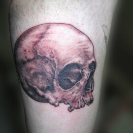 Tatouage tête de mort style réaliste