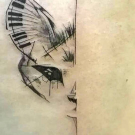 Tatouage graphique chat stylisé